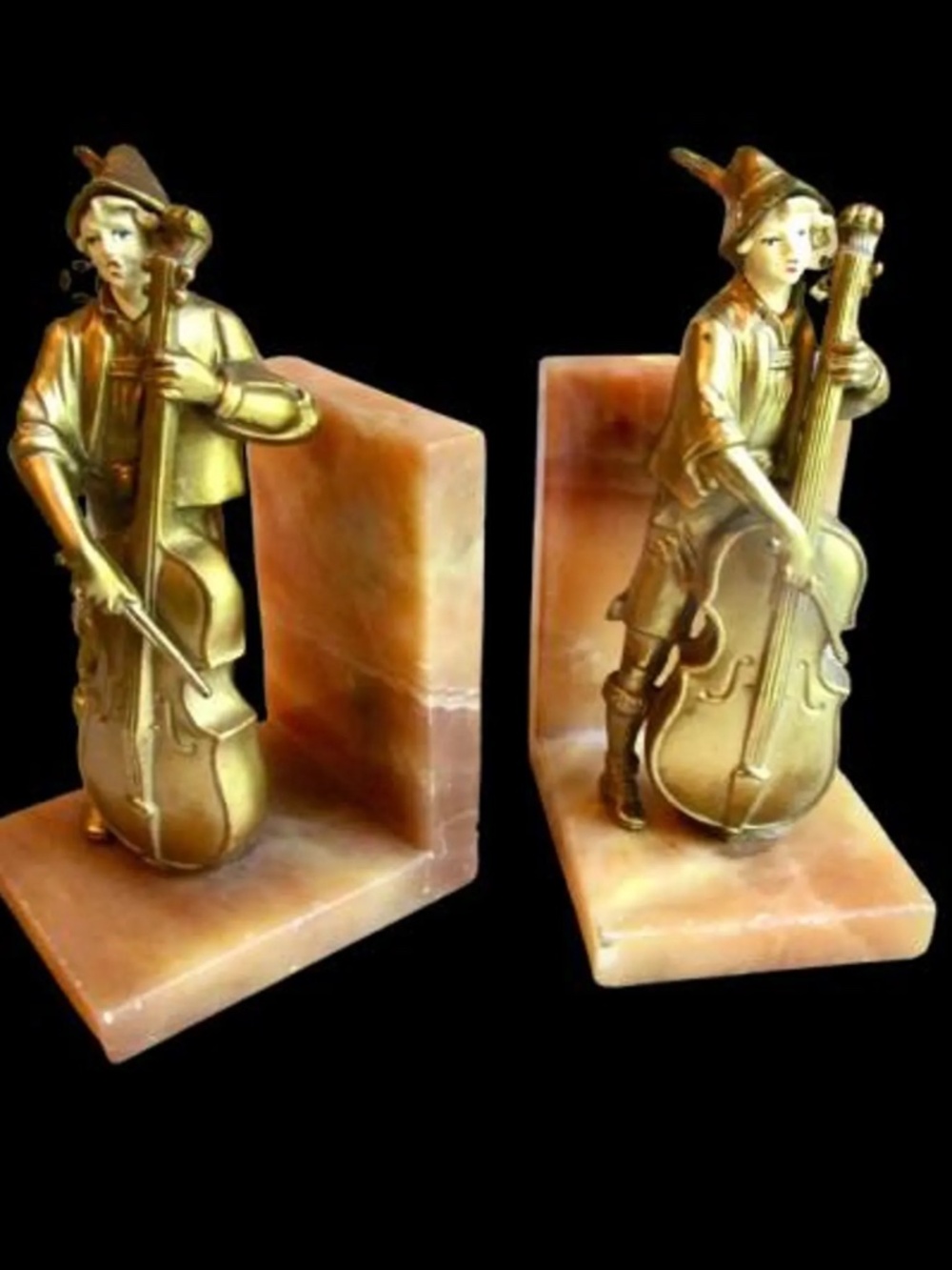 J.B. Hirsch art deco bookends featuring a cellist 1930s gold tone marble
